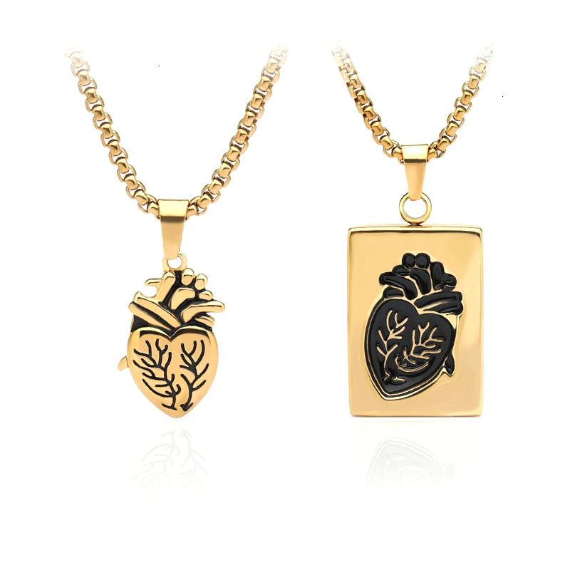 Two gold necklaces with heart-shaped pendants on a white background